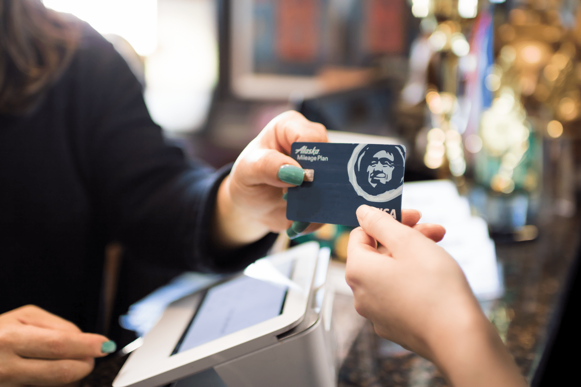 Woman paying with card