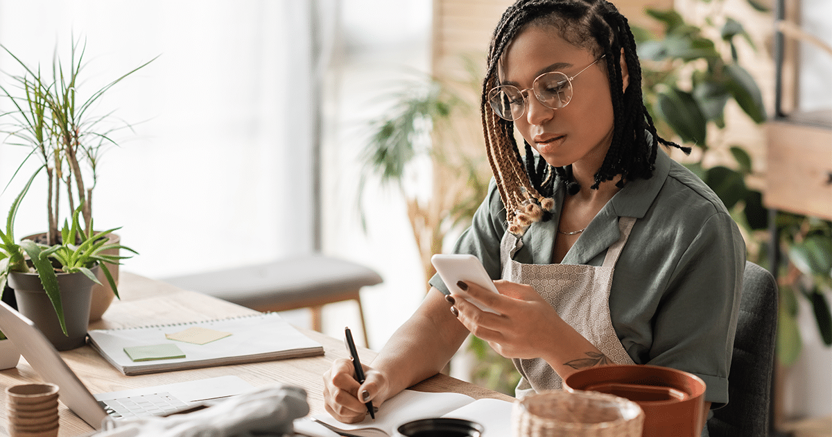 Female business owner managing transactions.