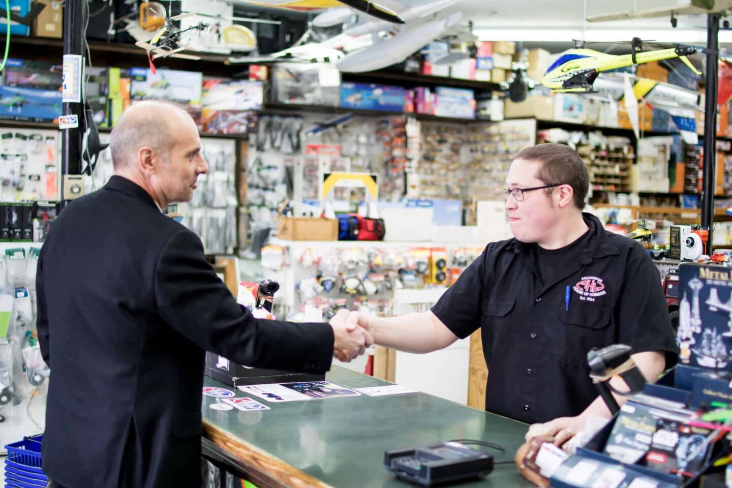 Customer and Cashier shaking hands