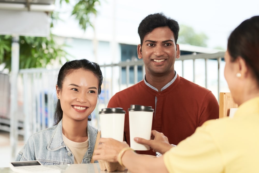 Coffeeshop customers using their reward system