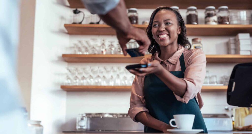 Woman uses mobile POS system